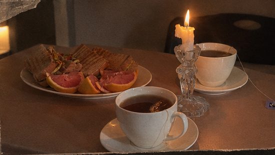 Tea for two and grapefruit by candlelight